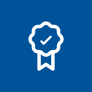 White award ribbon with a check mark on a blue background.